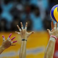 unnamed Hands of the players reach for the ball during a match between Indonesia against Vietnam in the women's volleyball at the 26th Southeast Asian Games (SEAGAMES) in Palembang, Sumatra province on November 17, 2011. AFP PHOTO/ROSLAN RAHMAN (Photo credit should read ROSLAN RAHMAN/AFP/Getty Images)